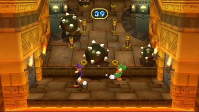 Yoshi et Waluigi esquivent les balles à pointes.