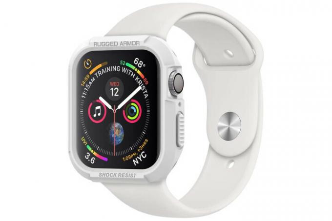 Zdjęcie przedstawia zegarek Apple Watch w białym etui Spigen Rugged Armor