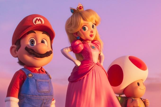 Mario, Persikas ir Rupūžė kartu stovi virš debesų „The Super Mario Bros. Filmas.