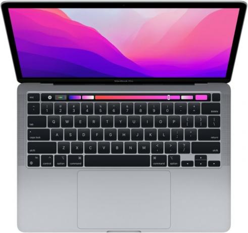 Macbook Pro 13 นิ้ว 2022 เปิดอยู่และมองเห็นคีย์บอร์ด แทร็กแพด และแผงควบคุมได้อย่างสมบูรณ์