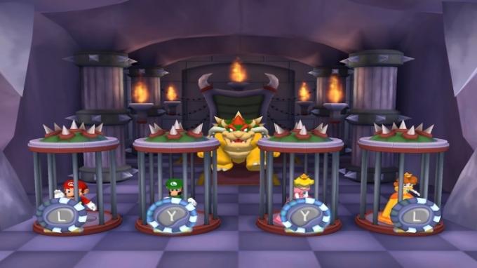 Bowser regarde les joueurs enfermés dans des cages.