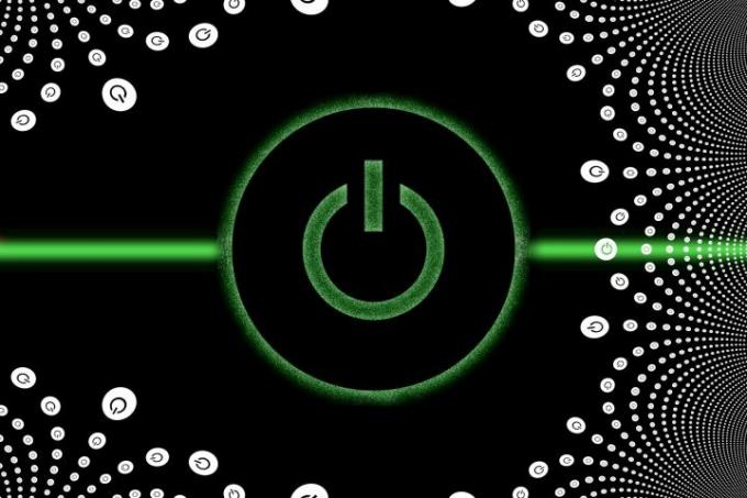 Graficzna reprezentacja przycisku zasilania w kolorach zielonym i białym pojawia się nad zieloną świecącą poziomą linią.