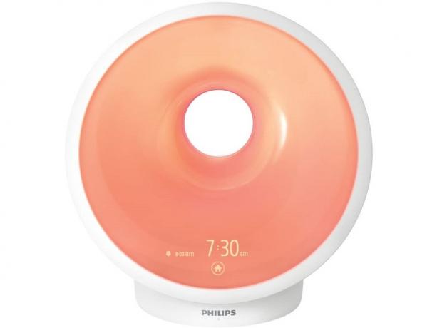 De Philips SmartSleep slaap- en wekkerlamp in zonsondergangmodus.