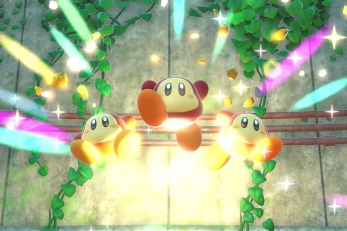 Tři Waddle Dee uniknou z klece v Kirby and the Forgotten Lands.