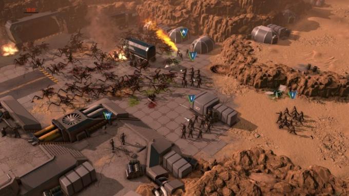 Vojaki ubijajo pajkovce v Starship Troopers: Terran Command.