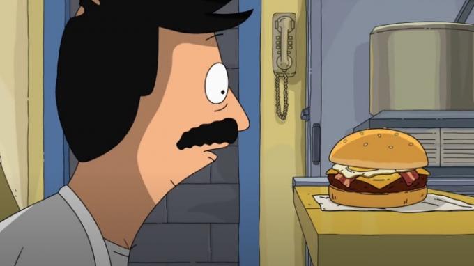 Bob perfectionne son burger d'entraînement dans le film Bob's Burgers