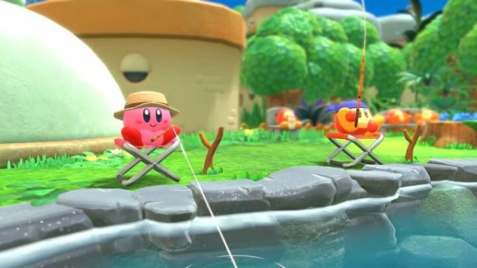 Kirby loví ryby s waddle dee v Kirby and the Forgotten Lands.