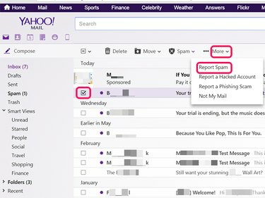 Clique em Mais e em Denunciar spam do Yahoo Mail.