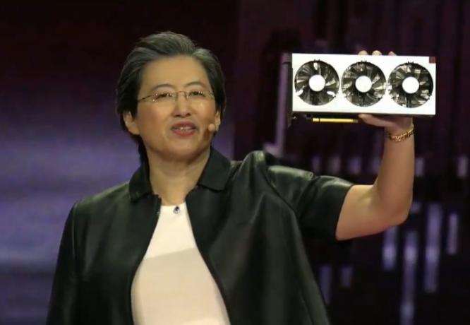CEO-ul AMD, Lisa Su, ține o placă grafică.