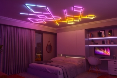 Nanoleaf Lines-lampen geïnstalleerd aan het plafond in een slaapkamer.