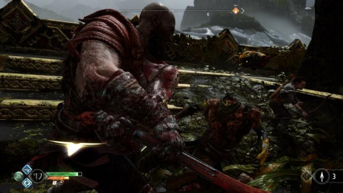 Kratos memenggal kepala musuh di God of War