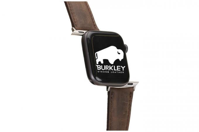 Zdjęcie przedstawia zegarek Apple Watch i brązowy skórzany pasek Burkley