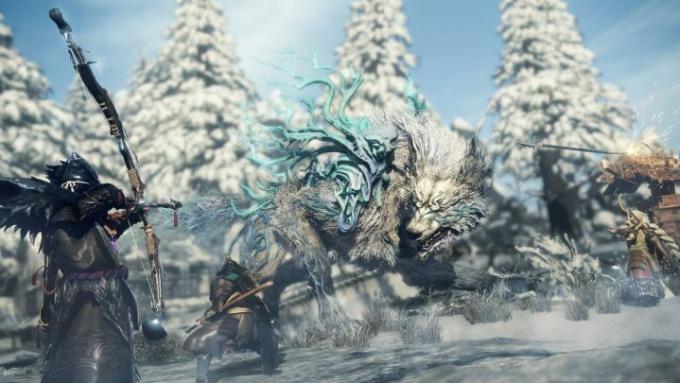 Trije igralci se borijo s pošastjo v Wild Hearts.