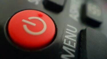 Close-up de um botão de espera vermelho