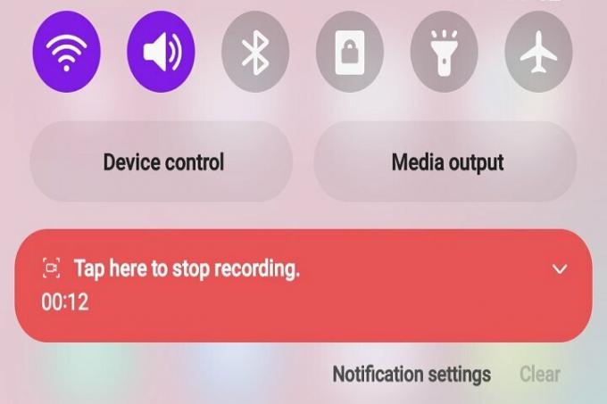 Opção “toque aqui para parar a gravação” no Android 12.