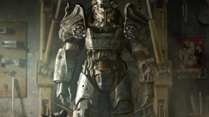 Fallout 4 key art menampilkan power armor suit yang digantung di gudang senjata.