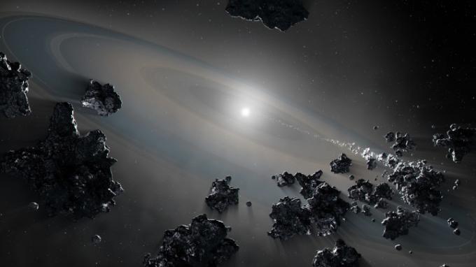 Ілюстрація, на якій зображено зірку білого карлика, яка викачує уламки з розбитих об’єктів планетарної системи. 