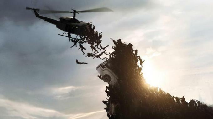 Zombie sa pokúšajú chytiť helikoptéru vo World War Z.