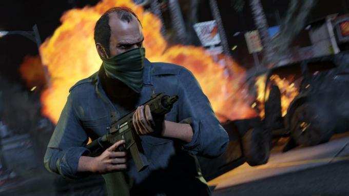 Trevor holder en pistol i Grand Theft Auto 5.