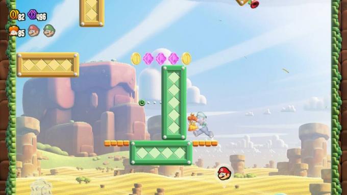 Daisy salta na parede em Super Mario Bros. Maravilha.