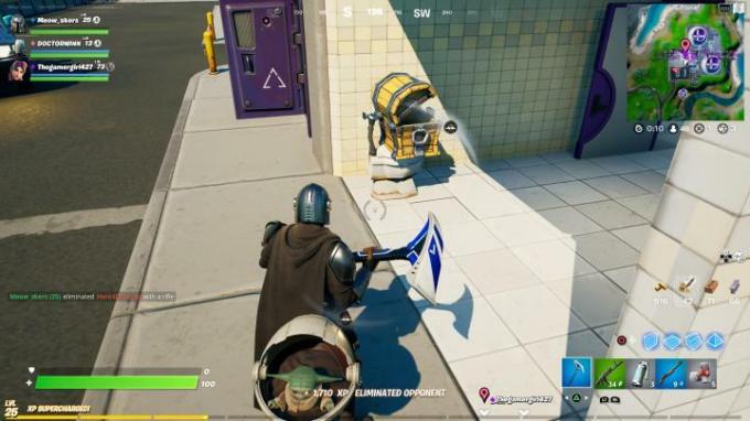 Toilet naast kapotte muur in Fortnite.