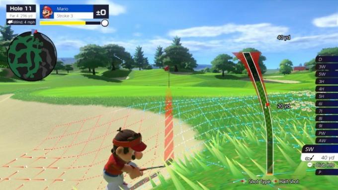 Mario går ut av en bunker i Mario Golf: Super Rush.