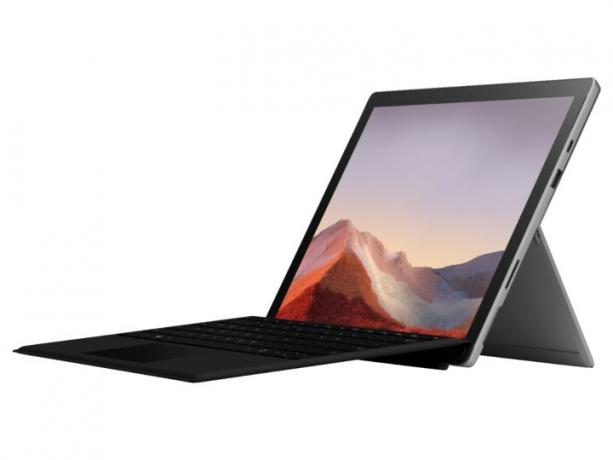 Microsoft Surface Pro 7 sub formă de laptop prin husa de tip atașată.