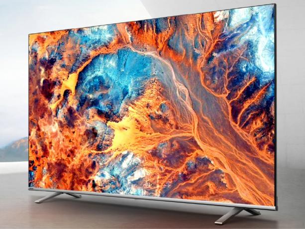 TV Api pintar 4K seri C350 kelas C350 Toshiba 55 inci di rak abu-abu dan latar belakang abu-abu terang.